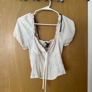 Cream/White corsetlike crop top with puff sleeves